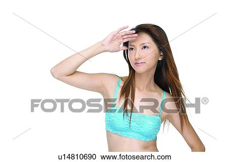 Stock Image - Young Adult, Long Hair, Asian Ethnicity, White Background, Brown Hair. Fotosearch