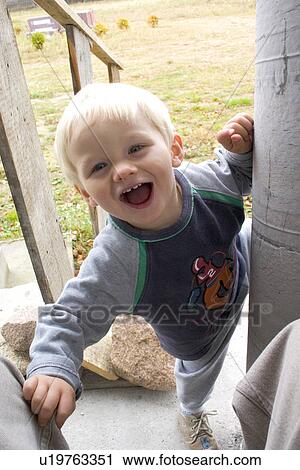 Happy toddler laughing View Large Photo Image Stock Image - Happy toddler laughing. Fotosearch