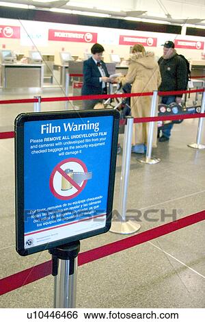 Stock Photograph - Sign warning not to send film through security equipment. Fotosearch