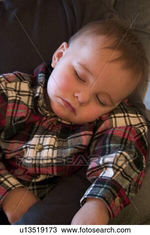 Stock Image - Young Boy Napping. Fotosearch