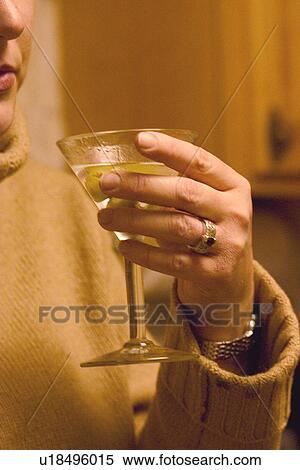 Stock Photography - Woman with martini. Fotosearch