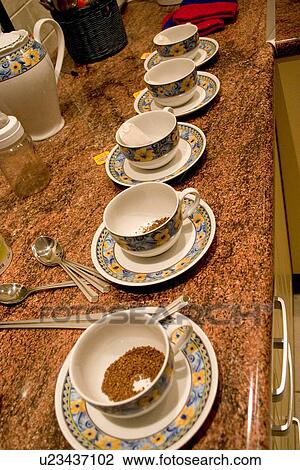 Stock Image - After dinner instant coffee waiting to be made in Poland. Fotosearch