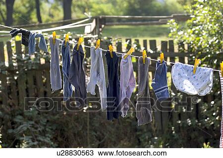 Stock Image - Clothes drying on a Polish farm. Fotosearch