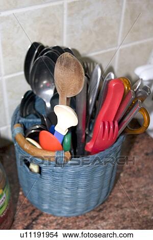 Picture - Polish kitchen basket holding utensils. Fotosearch