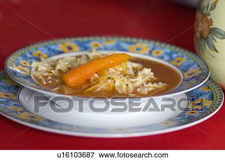 Polish Sunday dinner tomato soup with carrot and pasta View Large Photo Image Stock Photo - Polish Sunday dinner tomato soup with carrot and pasta. Fotosearch