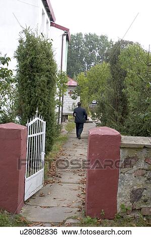 Walkway beside Polish Catholic church View Large Photo Image Stock Photograph - Walkway beside Polish Catholic church. Fotosearch