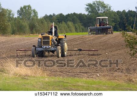 Farmers using tractors to cultivate fields View Large Photo Image Stock Image - Farmers using tractors to cultivate fields. Fotosearch