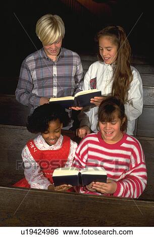 Multi-cultural kids singing in church View Large Photo Image Stock Photograph - Multi-cultural kids singing in church. Fotosearch