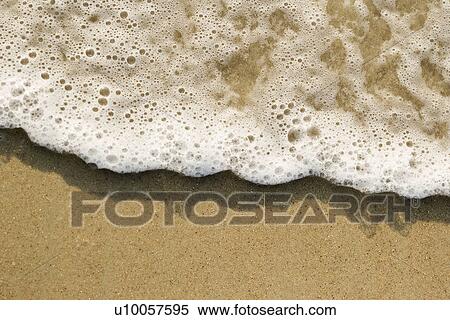 Close-up of sand and wave. View Large Photo Image Stock Photography - Close-up of sand and wave.. Fotosearch
