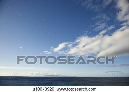Blue sky with fluffy white clouds over ocean horizen. View Large Photo Image Stock Image - Blue sky with fluffy white clouds over ocean horizen.. Fotosearch
