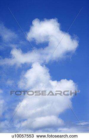 Stock Image - Cloud formation in blue sky.. Fotosearch