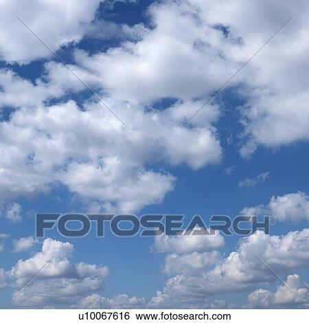 Stock Photograph - Clouds in blue sky.. Fotosearch