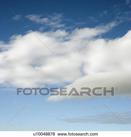 Fluffy white clouds in blue sky. View Large Photo Image Stock Photo - Fluffy white clouds in blue sky.. Fotosearch