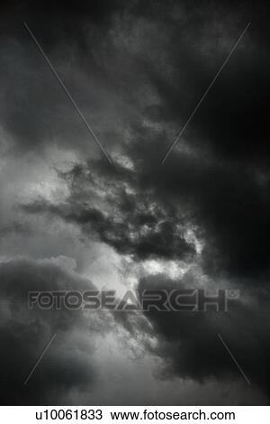 Stock Image - Ominous abstract storm clouds.. Fotosearch