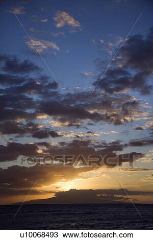 Sunset clouds over the coast of Kihei, Maui, Hawaii, USA. View Large Photo Image Stock Image - Sunset clouds over the coast of Kihei, Maui, Hawaii, USA.. Fotosearch