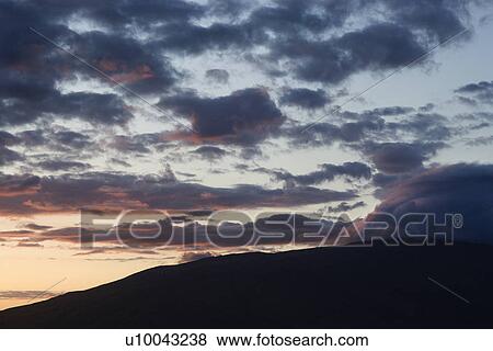 Sunset with clouds in Maui, Hawaii, USA. View Large Photo Image Stock Photo - Sunset with clouds in Maui, Hawaii, USA.. Fotosearch