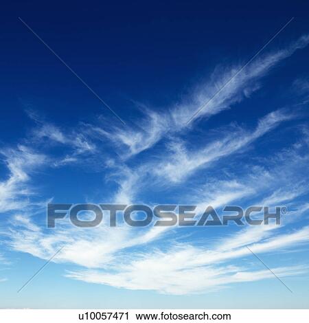 Wispy cirrus clouds in blue sky. View Large Photo Image Stock Image - Wispy cirrus clouds in blue sky.. Fotosearch