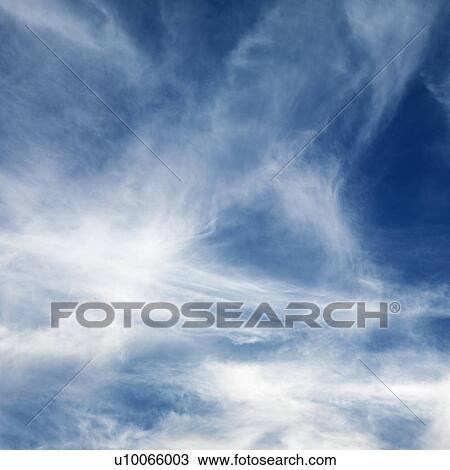 Wispy cloud formations against clear blue sky. View Large Photo Image Stock Image - Wispy cloud formations against clear blue sky.. Fotosearch