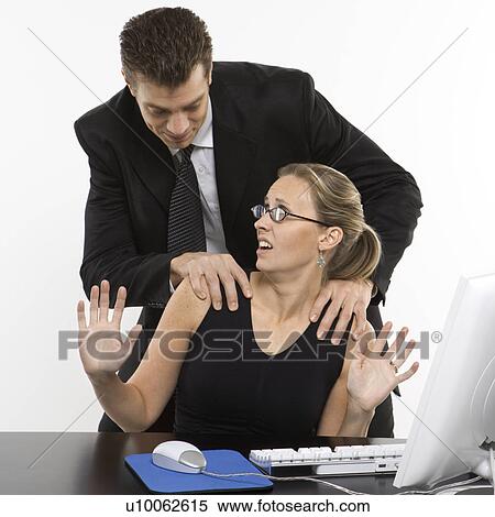 Caucasian mid-adult man sexually harassing woman sitting at computer. View Large Photo Image Stock Photography - Caucasian mid-adult man sexually harassing woman sitting at computer.. Fotosearch