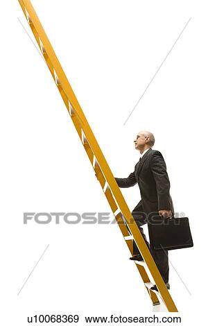 Stock Photo - Caucasian middle-aged businessman climbing ladder carrying briefcase.. Fotosearch