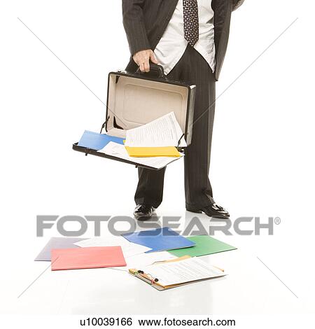 Caucasian middle-aged businessman holding open briefcase with papers falling out. View Large Photo Image Stock Photograph - Caucasian middle-aged businessman holding open briefcase with papers falling out.. Fotosearch