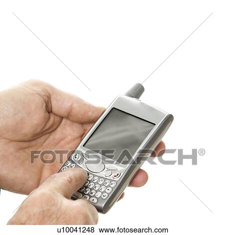 Stock Photo - Close-up of Caucasian middle-aged businessman using handheld PDA.. Fotosearch