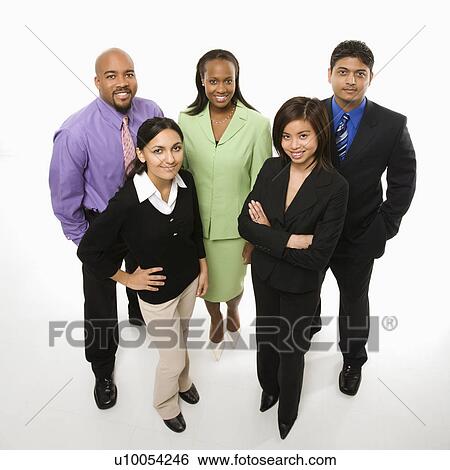 Stock Photograph - Portrait of multi-ethnic business group standing looking at viewer.. Fotosearch