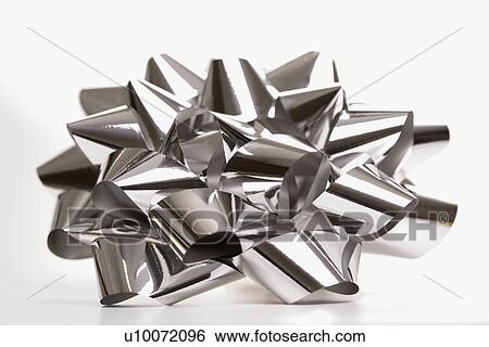 Still life of big shiny silver Christmas bow. View Large Photo Image Stock Photograph - Still life of big shiny silver Christmas bow.. Fotosearch