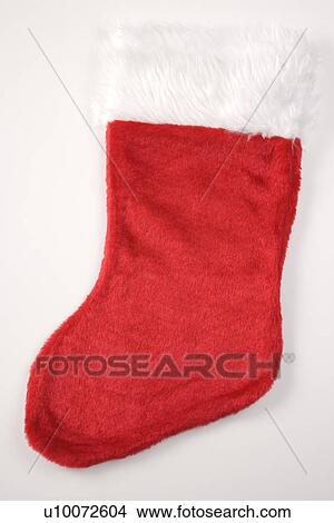 Picture - Still life of furry red Christmas stocking.. Fotosearch