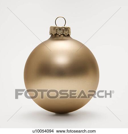 Still life of gold Christmas ornament. View Large Photo Image Picture - Still life of gold Christmas ornament.. Fotosearch