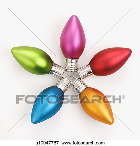 Stock Photo - Still life of multicolored Christmas ornaments arranged in star shape.. Fotosearch