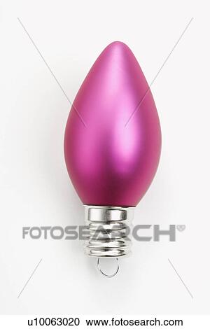Stock Image - Still life of pink Christmas ornament.. Fotosearch