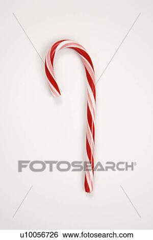 Stock Photograph - Still life of red and white candy cane.. Fotosearch