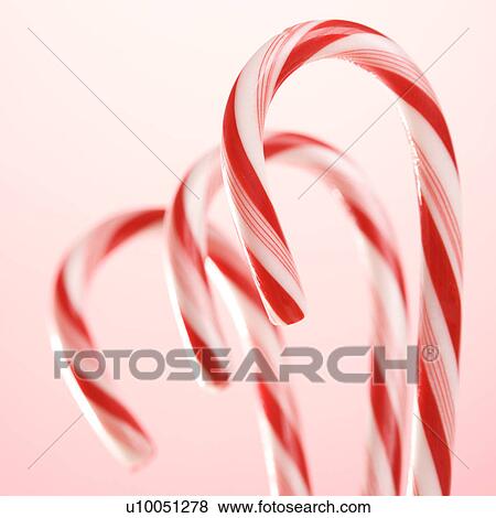 Stock Photo - Still life of three candy canes.. Fotosearch