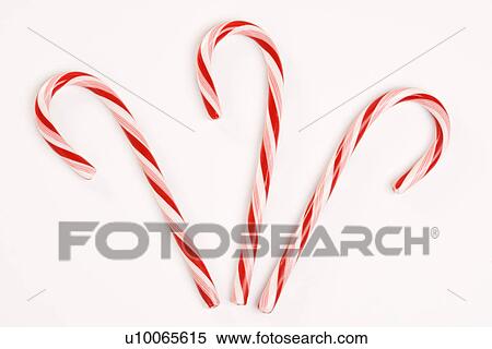 Stock Photography - Still life of three candy canes.. Fotosearch