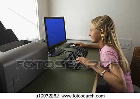 Caucasian pre-teen girl using computer. View Large Photo Image Stock Image - Caucasian pre-teen girl using computer.. Fotosearch