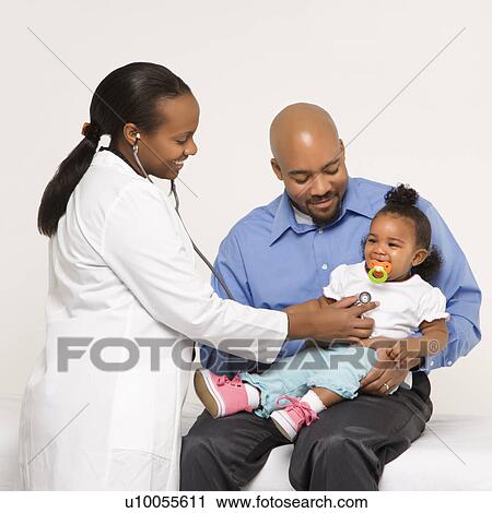 African-American female pediatrician examining baby girl being held by father. View Large Photo Image Stock Image - African-American female pediatrician examining baby girl being held by father.. Fotosearch