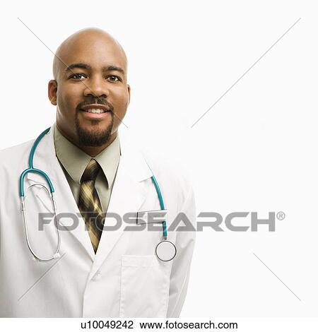 Portrait of smiling African-American man doctor wearing uniform standing against white background. View Large Photo Image Stock Image - Portrait of smiling African-American man doctor wearing uniform standing against white background.. Fotosearch
