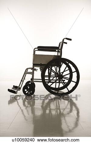 Side view of empty wheelchair. View Large Photo Image Stock Image - Side view of empty wheelchair.. Fotosearch