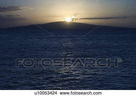 Picture - Sunset over the coast of Kihei, Maui, Hawaii, USA.. Fotosearch