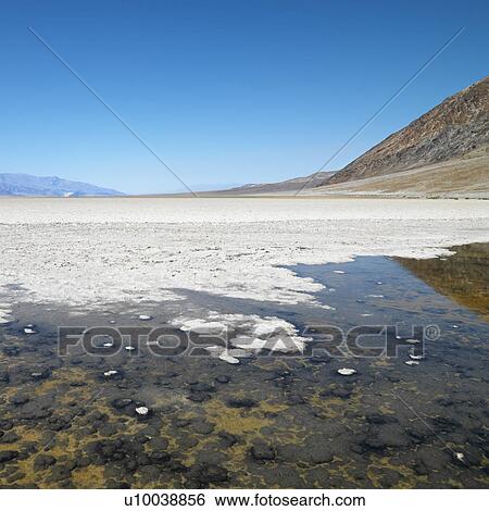 Stock Photograph - Badwater Basin in Death Valley National Park.. Fotosearch
