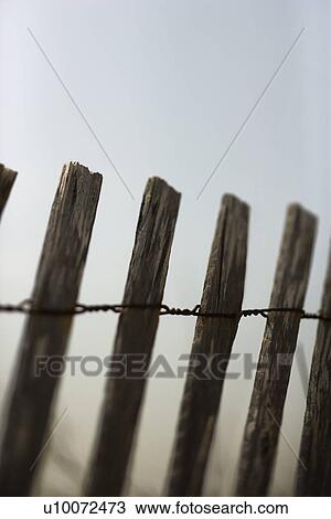 Stock Image - Close-up of weathered wooden fence.. Fotosearch