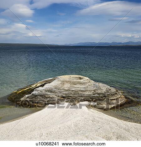 Geyser formation at water's edge in Yellowstone National Park, Wyoming. View Large Photo Image Stock Image - Geyser formation at water's edge in Yellowstone National Park, Wyoming.. Fotosearch