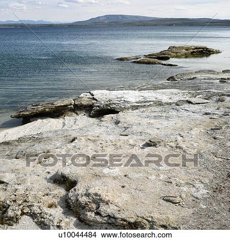 Picture - Rocky shoreline at Yellowstone National Park, Wyoming.. Fotosearch