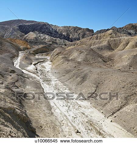 Barren landscape in Death Valley National Park. View Large Photo Image Stock Photography - Barren landscape in Death Valley National Park.. Fotosearch