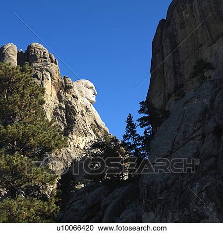 Stock Image - Profile view of George Washington carving in Mount Rushmore National Memorial.. Fotosearch