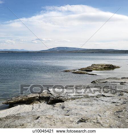 Rocky shoreline at Yellowstone National Park, Wyoming. View Large Photo Image Stock Image - Rocky shoreline at Yellowstone National Park, Wyoming.. Fotosearch