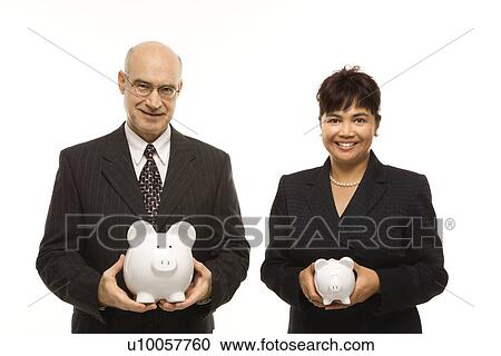 Caucasian middle-aged businessman and Filipino businesswoman holding different sized piggybanks. View Large Photo Image Stock Image - Caucasian middle-aged businessman and Filipino businesswoman holding different sized piggybanks.. Fotosearch