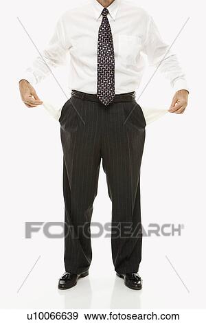 Caucasian middle-aged businessman pulling empty pockets out standing against white background. View Large Photo Image Stock Photo - Caucasian middle-aged businessman pulling empty pockets out standing against white background.. Fotosearch
