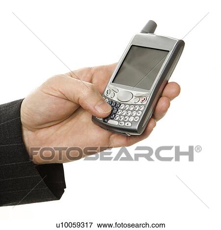 Close-up of Caucasian middle-aged businessman using handheld PDA. View Large Photo Image Stock Photo - Close-up of Caucasian middle-aged businessman using handheld PDA.. Fotosearch